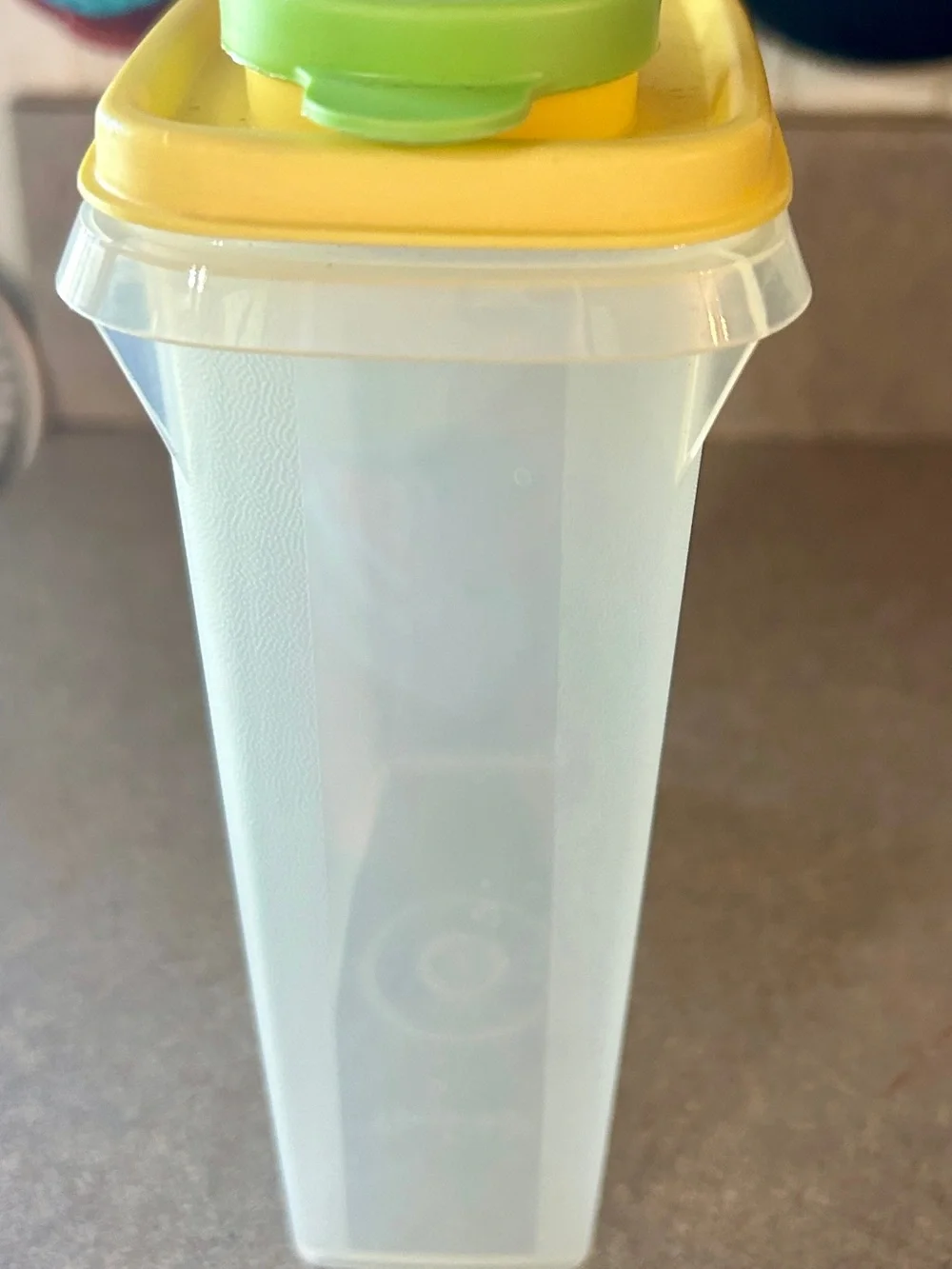 Tupperware Yellow-Lid Dry Goods Container with Green Scoop